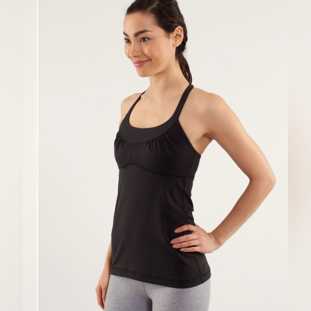 Lululemon Scoop Me Up Tank
Black hip length size 8 built in shelf bra